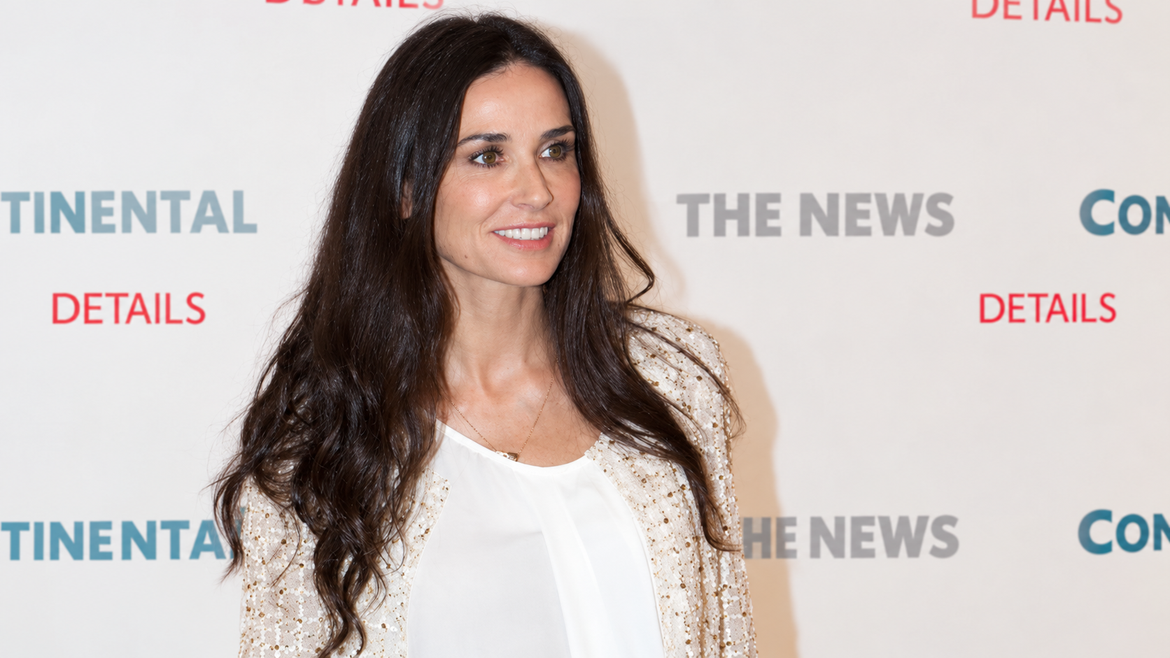 AI-modified archive portrait of Demi Moore; not a photograph of the reported event.