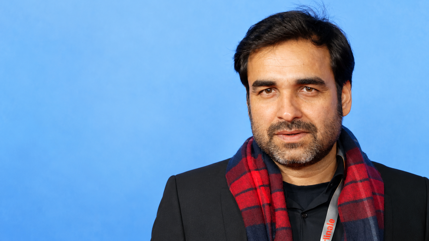 AI-modified archive photograph of Pankaj Tripathi at the 2017 Berlinale; not a Mirzapur still, current event photograph or endorsement.